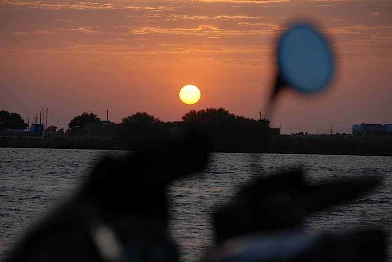 Sun sinking across the Nile