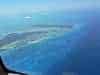 Bimimini Island and the famed Bimini Road streaking out to the left in front of the sandspit