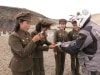 Tony giving the Paektu guides a token of his appreciation