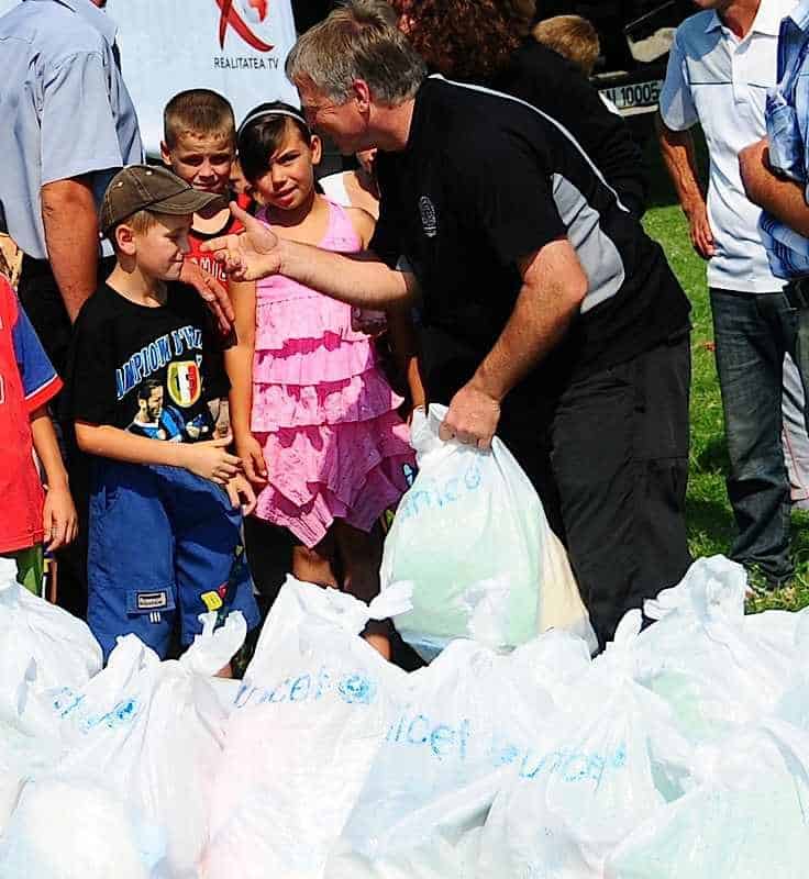 Chris works his way through a pile to be distributed