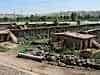 The greenhouses that frequent the productive lands. Cloth tops pulled over at night to keep the warmth in