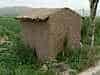 Implement shed made of straw