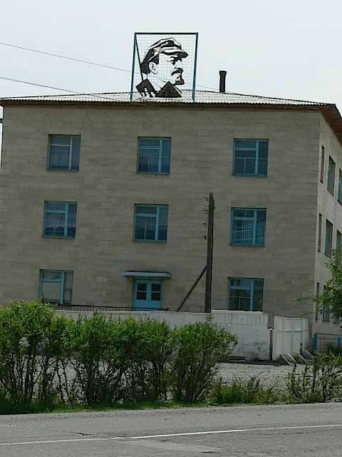 Evidence of the Soviet era remains everywhere - lenin atop an office block