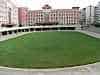 Playing fields below the classroom tower blocks