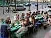 A street feed with staff and Silkies