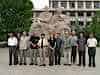 In front of statue of Rewi and George Hogg - Headmaster Mr Chen, Silkies and senior staff