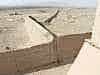 The wall leading away from the fort