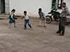 Hopscotch with the local kids