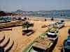 Acapulco's beach - were traditional fishers share with hordes of sunbathing visitors